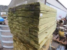 PACK OF PRESSURE TREATED FEATHER EDGE TIMBER CLADDING BOARDS: 1.35M LENGTH X 100MM WIDTH APPROX.