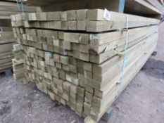 LARGE BUNDLE OF TREATED TIMBER POSTS, MAINLY 2.7M LENGTH X 55MM X 45MM APPROX: 225NO IN TOTAL APPROX