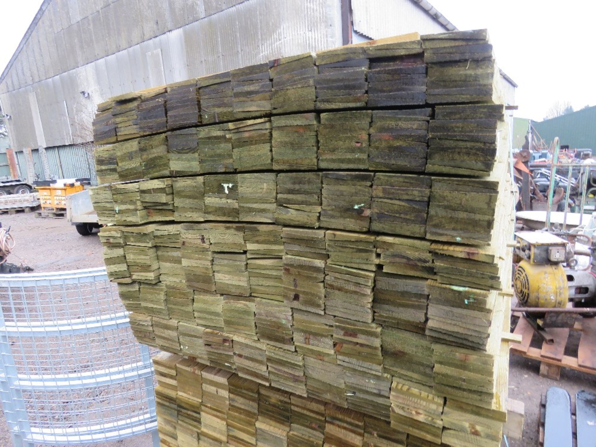 PACK OF PRESSURE TREATED FEATHER EDGE TIMBER CLADDING BOARDS: 1.35M LENGTH X 100MM WIDTH APPROX. - Image 2 of 3