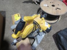 DEWALT 110VOLT MITRE SAW PLUS A STAND IN A BOX. DIRECT FROM RETIRING BUILDER. THIS LOT IS S
