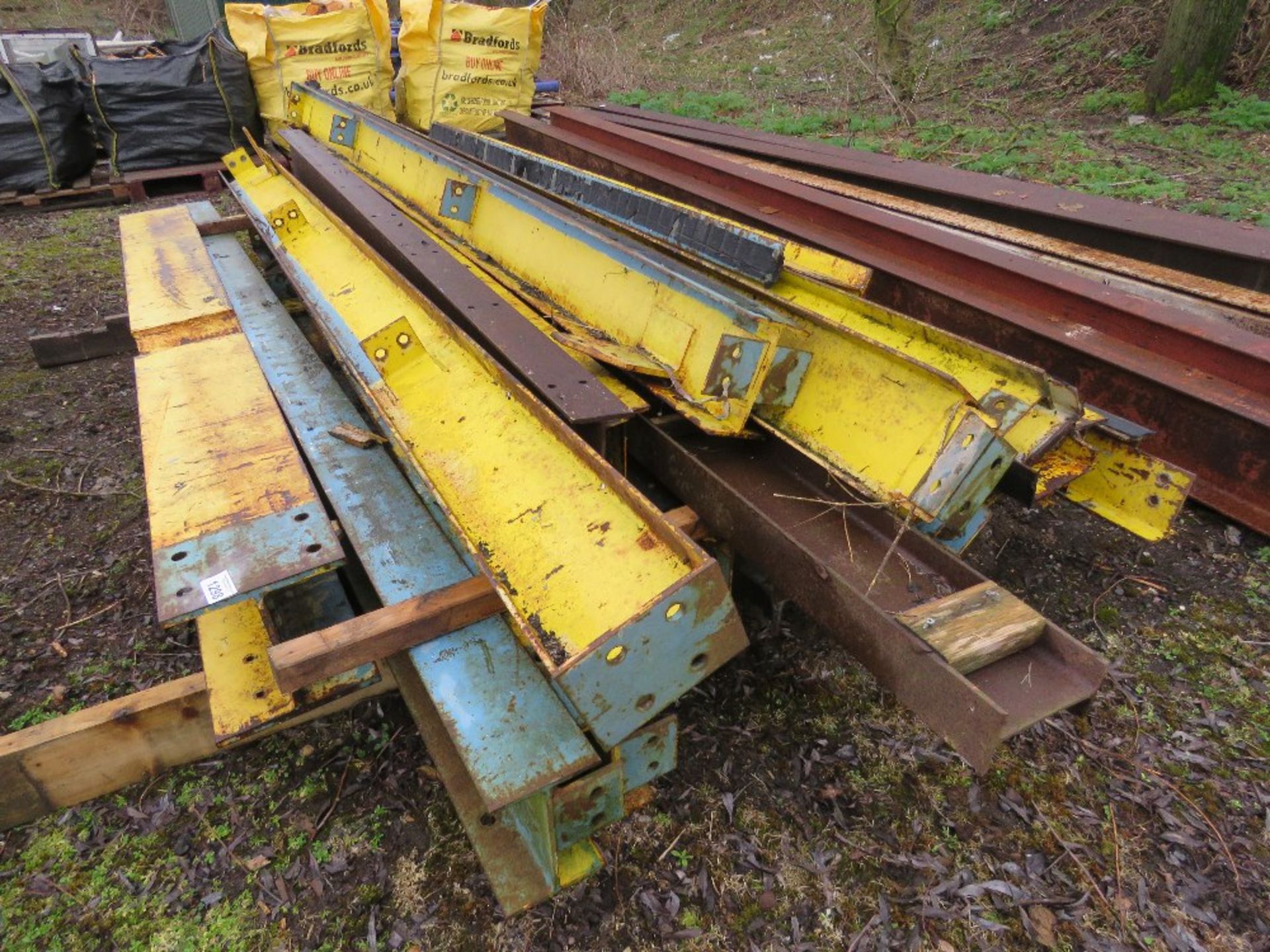 STACK OF YELLOW HEAVY DUTY RSJ STEEL LINTELS, MAINLY 2.9M - 4.8M LENGTH APPROX.