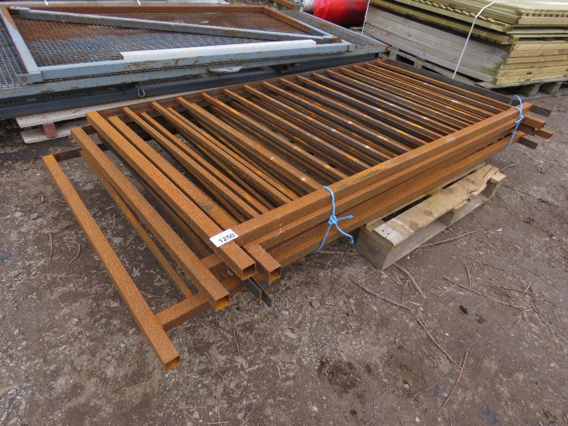STACK OF STEEL RAILINGS, 2M-2.6M WIDE @ 1M HEIGHT, 6NO IN TOTAL. THIS LOT IS SOLD UNDER THE AUCT