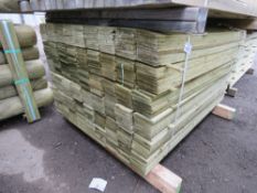 LARGE PACK OF PRESSURE TREATED FEATHER EDGE CLADDING TIMBER BOARDS: 1.35M LENGTH X 100MM WIDTH APPRO