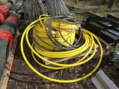 YELLOW 32MM PIPE PLUS A LENGTH OF ARMOURED CABLE.