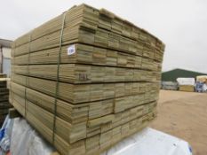 PACK OF PRESSURE TREATED HIT AND MISS TYPE TIMBER CLADDING BOARDS: 1.42M LENGTH X 100MM WIDTH APPROX