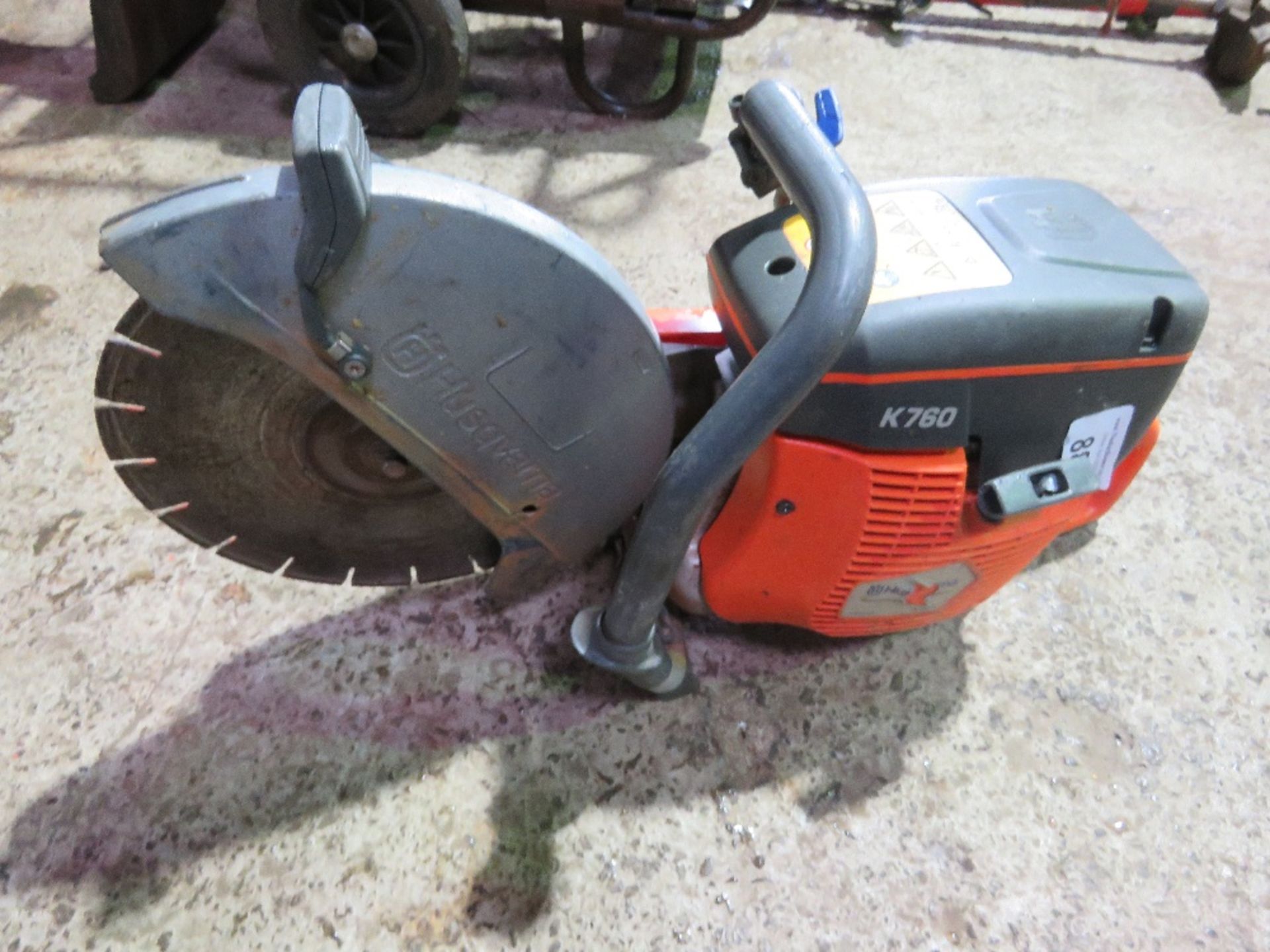 HUSQVARNA K760 PETROL ENGINED CUT OFF SAW WITH A BLADE. THIS LOT IS SOLD UNDER THE AUCTIONEERS MA