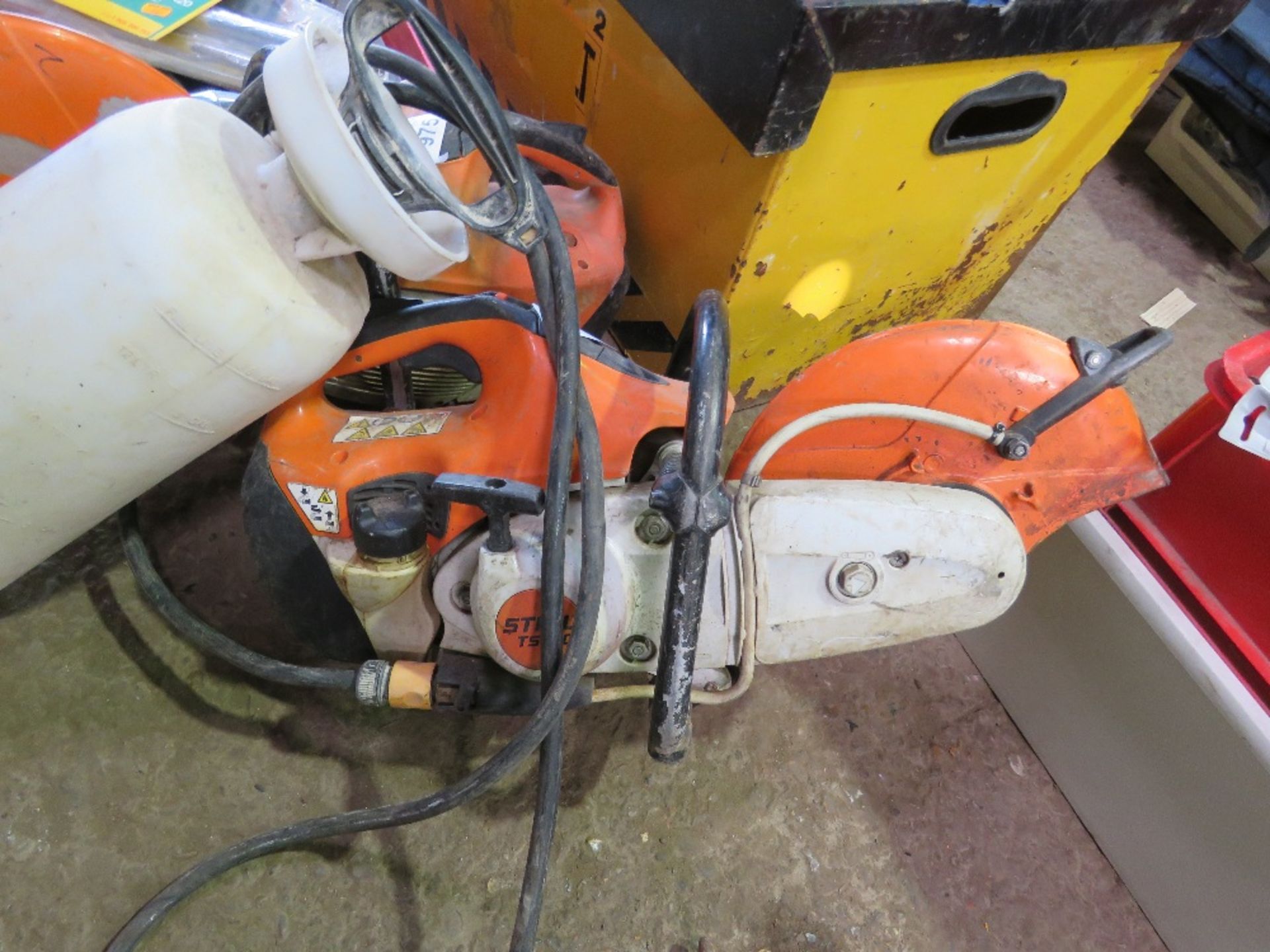 STIHL TS410 TYPE PETROL CUT OFF SAW PLUS A WET CUT BOTTLE. THIS LOT IS SOLD UNDER THE AUCTIONEERS - Image 4 of 4