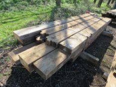 BUNDLE OF PRE-USED DENAILED HEAVY DUTY TIMBER JOISTS : APPROXIMATE SIZES 9" WIDTH @ 9-14FT LENGTH BE