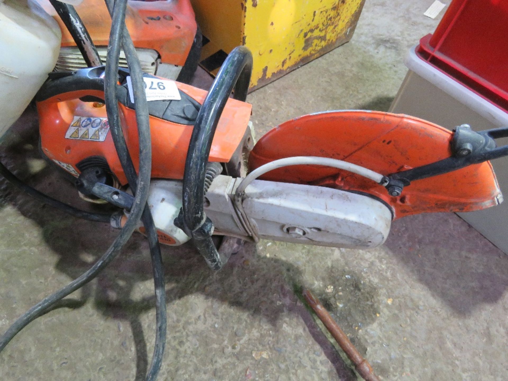 STIHL TS410 TYPE PETROL CUT OFF SAW PLUS A WET CUT BOTTLE. THIS LOT IS SOLD UNDER THE AUCTIONEERS - Image 3 of 4