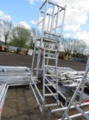 ALUMINIUM PODIUM , 1.9M MAX PLATFORM HEIGHT WITH DECK AND LADDER AS SHOWN.. THIS LOT IS SOLD UNDE