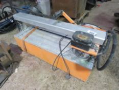 TILE CUTTING SAWBENCH, 240VOLT POWERED. THIS LOT IS SOLD UNDER THE AUCTIONEERS MARGIN SCHEME, THERE