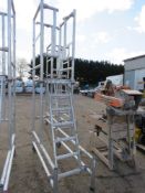 ALUMINIUM PODIUM , 1.9M MAX PLATFORM HEIGHT WITH DECK AND LADDER AS SHOWN.. THIS LOT IS SOLD UNDE