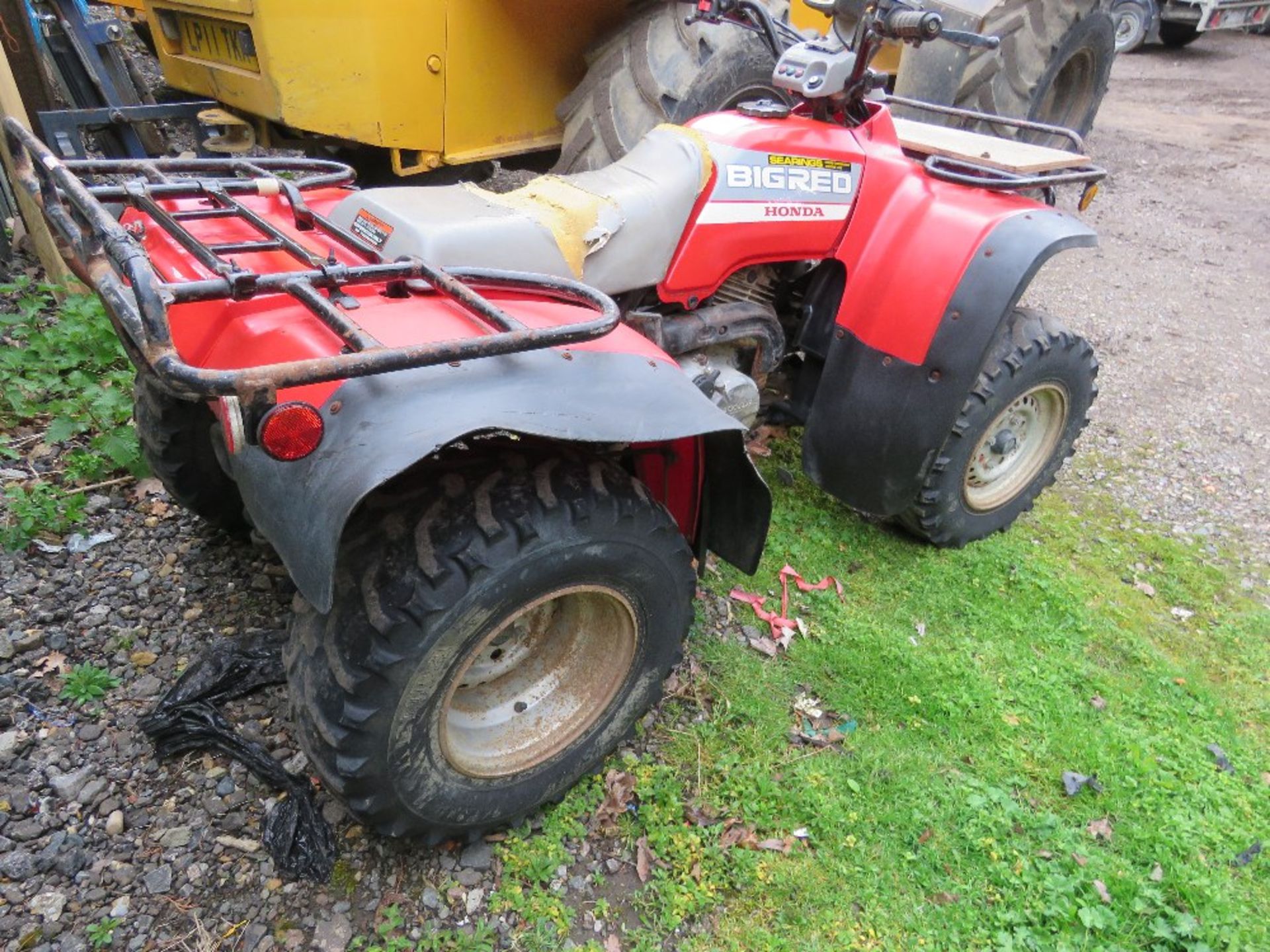 HONDA BIG RED 4WD PETROL ENGINED QUAD BIKE. WHEN TESTED WAS SEEN TO DRIVE, STEER AND BRAKE SOURCED F - Image 4 of 9