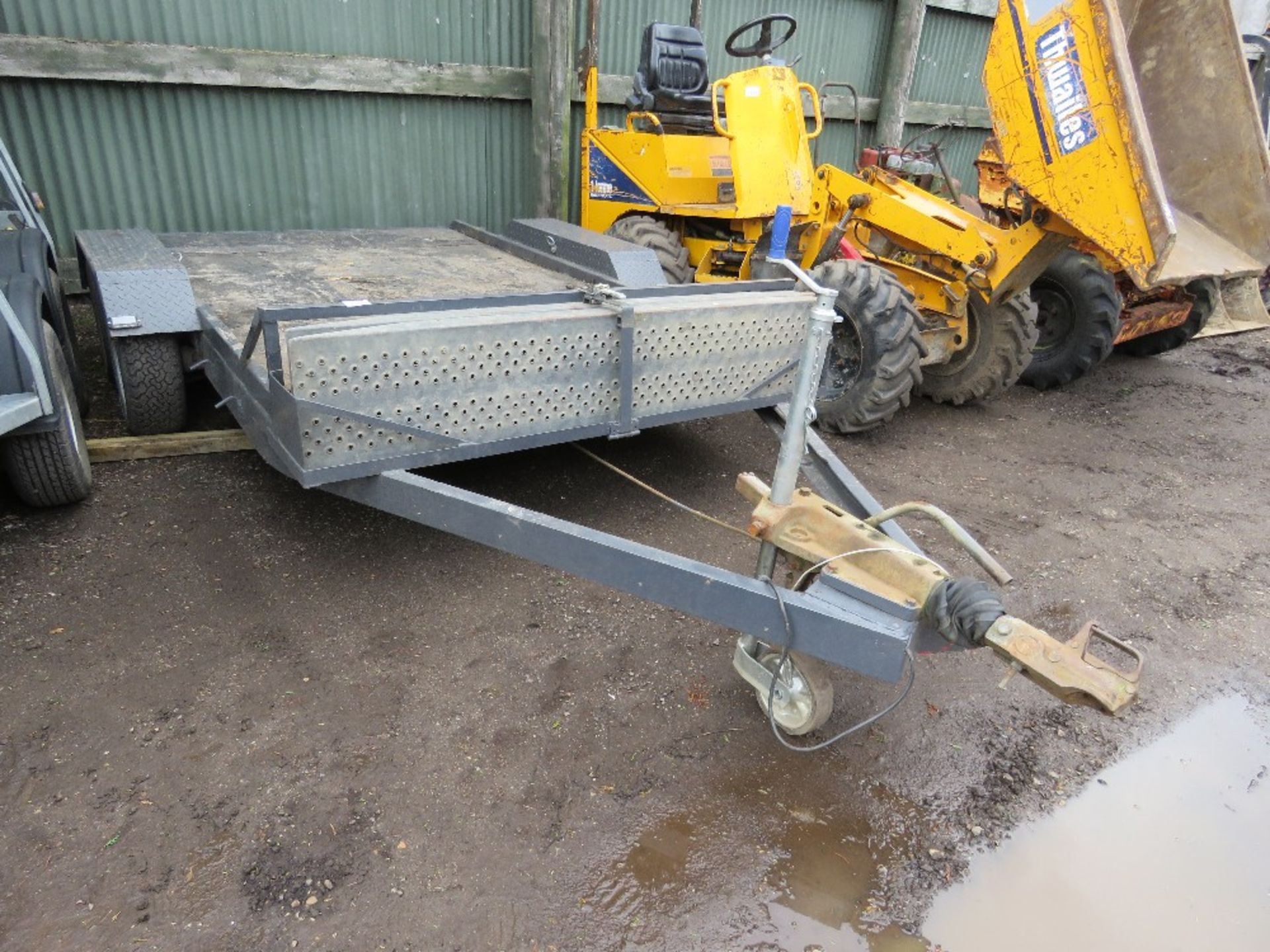 HEAVY DUTY TWIN AXLED PLANT TRAILER: 1.7M X 3M BED APPROX PLUS RAMP STORAGE FRAME ON THE FRONT. 1.7M