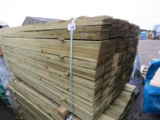 LARGE PACK OF TREATED FEATHER EDGE TIMBER FENCE CLADDING BOARDS: 100MM WIDTH @ 1.8M LENGTH APPROX.