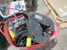 SCAFFOLD HOIST PLUS A BEAM CLAMP, 110VOLT POWERED. THIS LOT IS SOLD UNDER THE AUCTIONEERS MARGIN