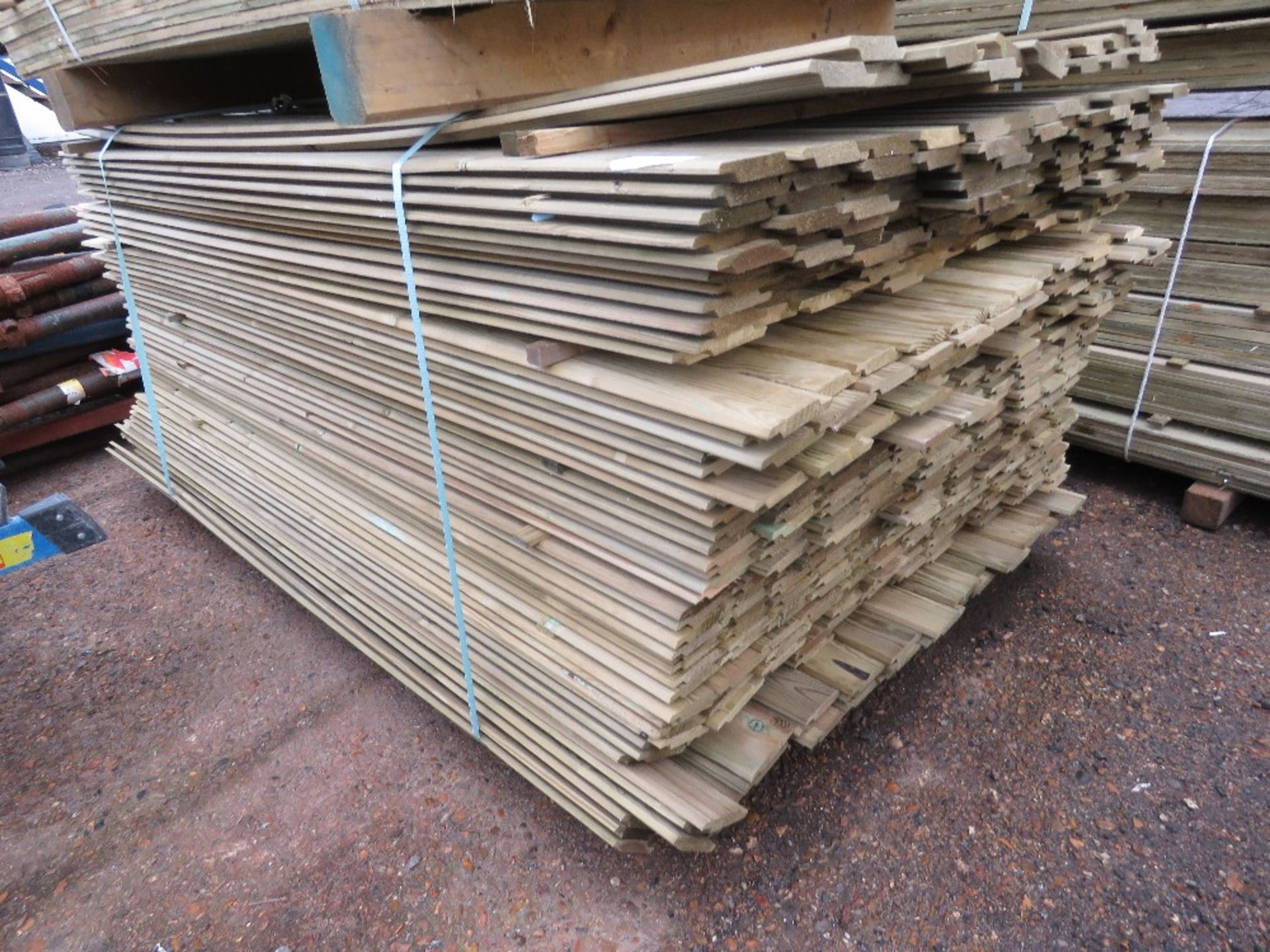 LARGE PACK OF TREATED SHIPLAP TYPE CLADDING BOARDS, 1.7-1.83M LENGTH X 100MM WIDTH APPROX.