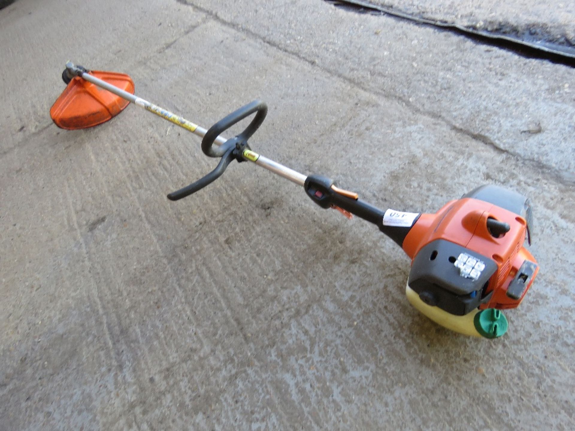 HUSQVARNA PETROL STRIMMER. THIS LOT IS SOLD UNDER THE AUCTIONEERS MARGIN SCHEME, THEREFORE NO VAT