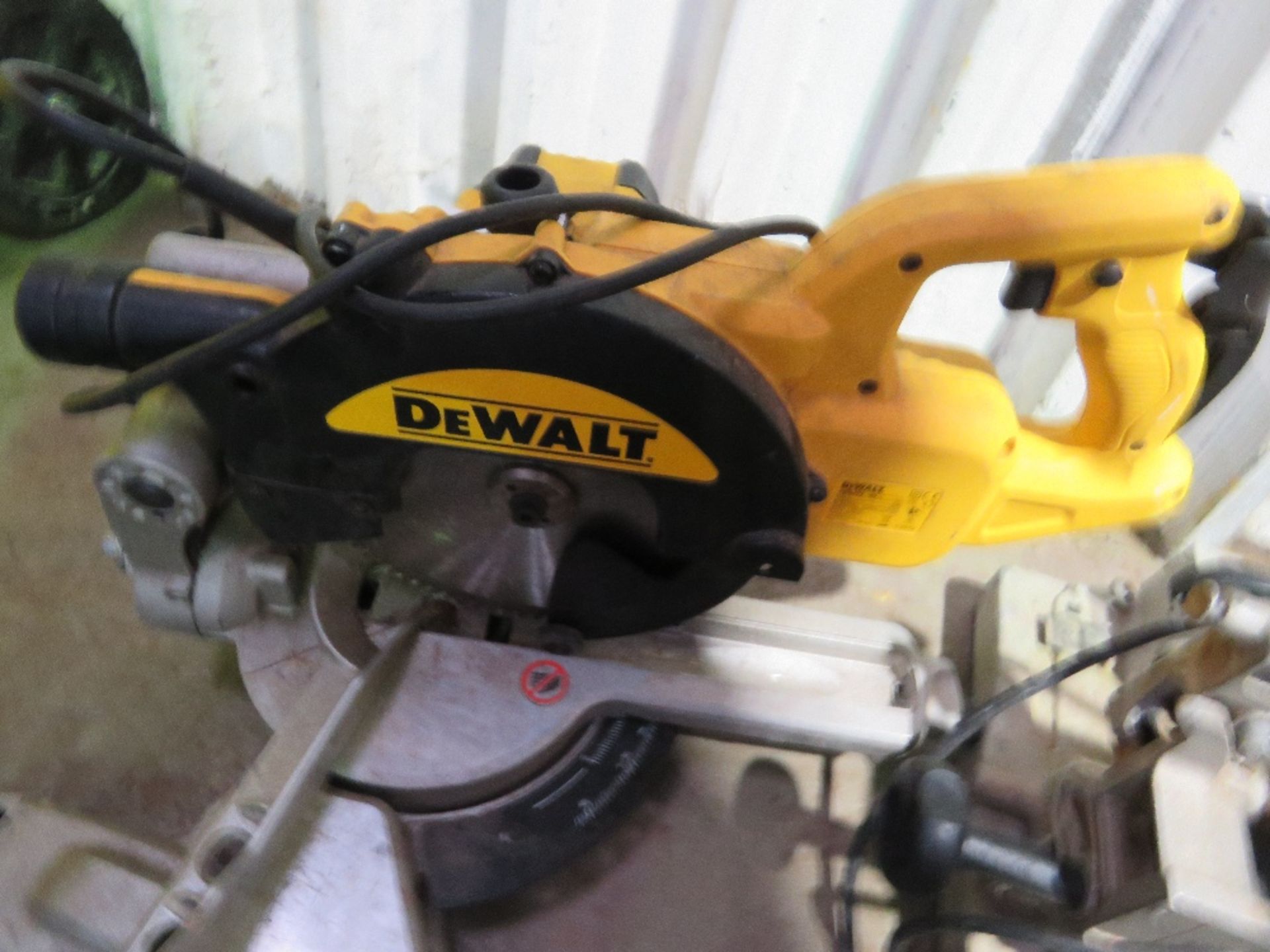 DEWALT 240VOLT MITRE SAW. THIS LOT IS SOLD UNDER THE AUCTIONEERS MARGIN SCHEME, THEREFORE NO VAT - Image 2 of 3