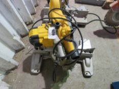 DEWALT 240VOLT MITRE SAW. THIS LOT IS SOLD UNDER THE AUCTIONEERS MARGIN SCHEME, THEREFORE NO VAT