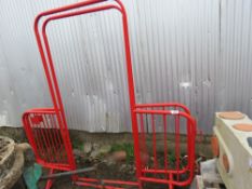 2 X RED METAL CROWD BARRIER GATES. THIS LOT IS SOLD UNDER THE AUCTIONEERS MARGIN SCHEME, THEREFOR