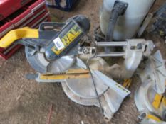 DEWALT PROFESSIONAL SLIDING HEAD MITRE SAW. THIS LOT IS SOLD UNDER THE AUCTIONEERS MARGIN SCHEME,