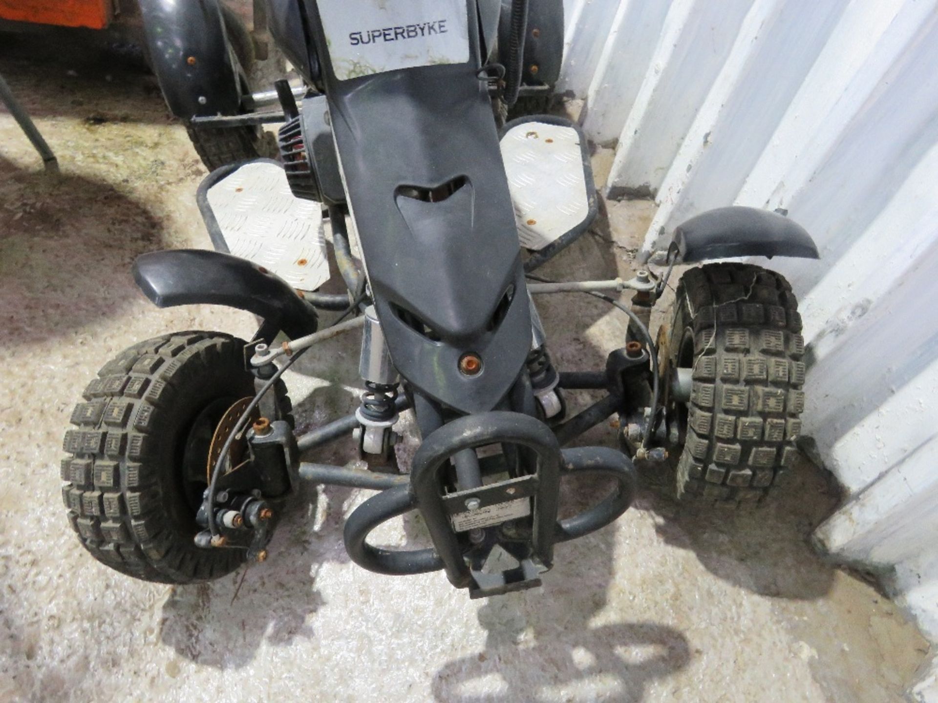 MINI PETROL ENGINED QUAD BIKE. FROM STORAGE, CONDITION UNKNOWN. THIS LOT IS SOLD UNDER THE AUCTION - Image 2 of 5