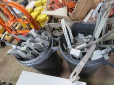 2 X DUSTBINS CONTAINING ASSORTED JOIST HANGERS. THIS LOT IS SOLD UNDER THE AUCTIONEERS MARGIN SCH