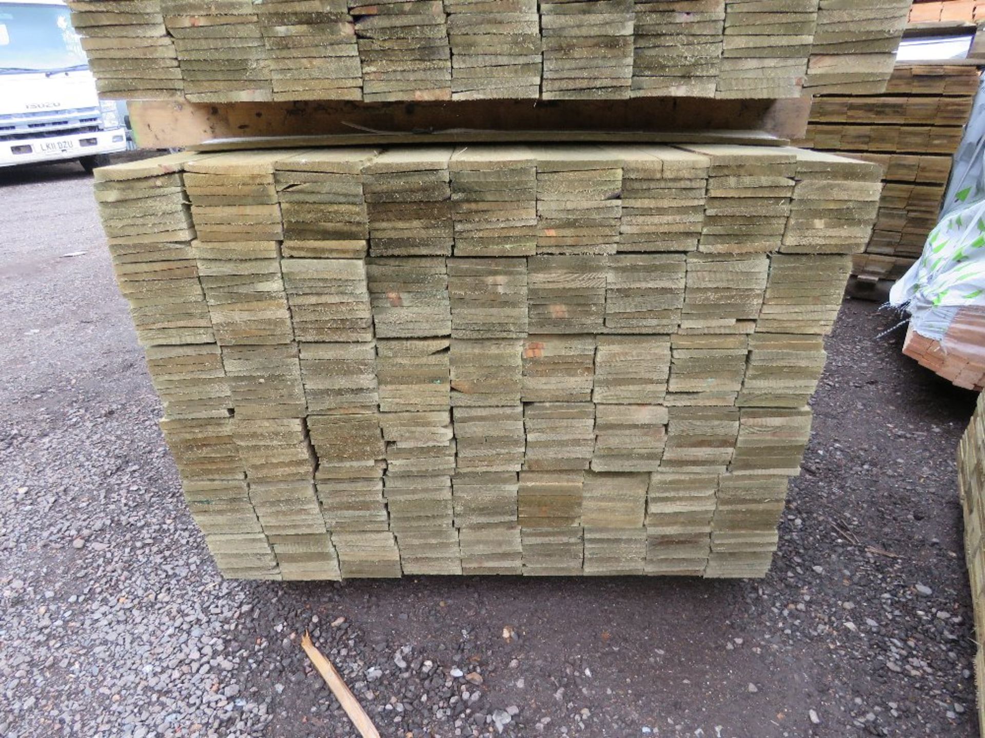LARGE PACK OF TREATED FEATHER EDGE TIMBER CLADDING BOARDS, 1.80M LENGTH X 100MM WIDTH APPROX. - Image 2 of 2