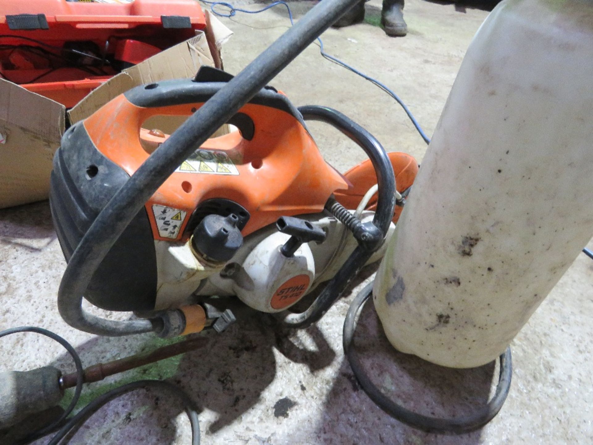 STIHL TS410 TYPE PETROL CUT OFF SAW PLUS A WET CUT BOTTLE. THIS LOT IS SOLD UNDER THE AUCTIONEERS - Image 2 of 4