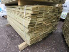 LARGE PACK OF TREATED FEATHER EDGE TIMBER CLADDING BOARDS, 1.7M LENGTH X 100MM WIDTH APPROX.