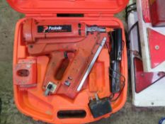 PASLODE IM350 NAIL GUN IN A CASE.