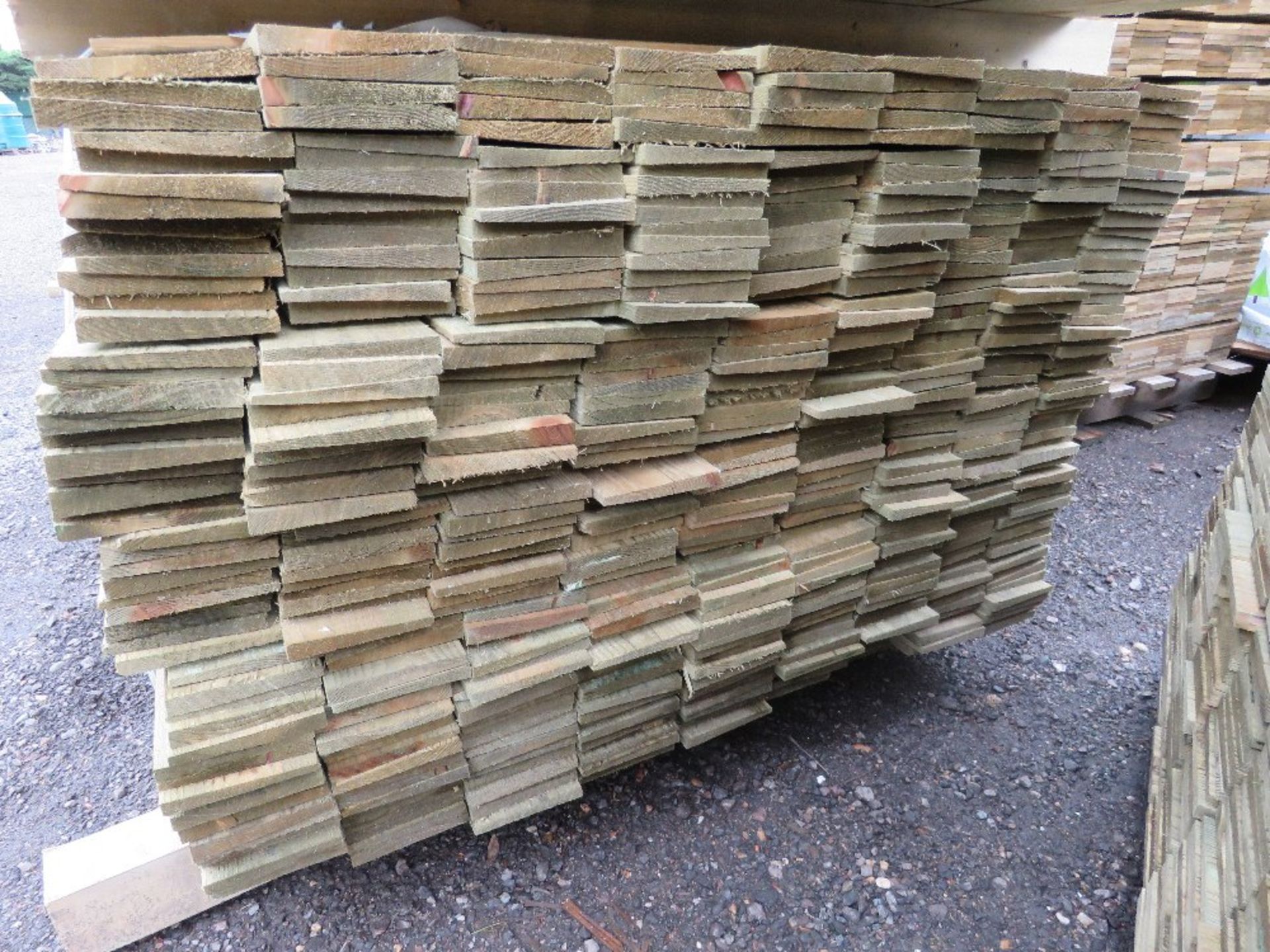 LARGE PACK OF TREATED FEATHER EDGE TIMBER CLADDING BOARDS, 1.7M LENGTH X 100MM WIDTH APPROX. - Image 2 of 2