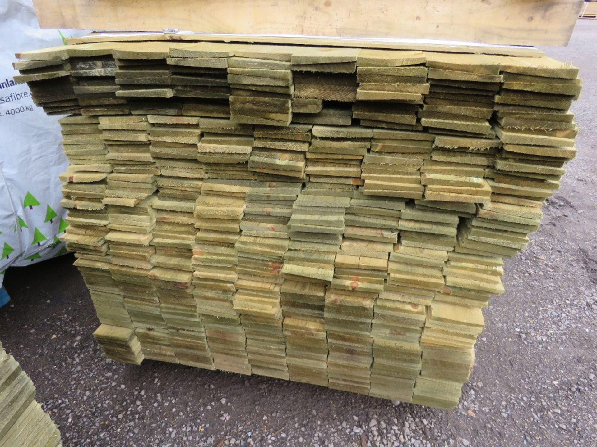 LARGE PACK OF TREATED FEATHER EDGE TIMBER CLADDING BOARDS, 1.65M LENGTH X 100MM WIDTH APPROX. - Image 2 of 2