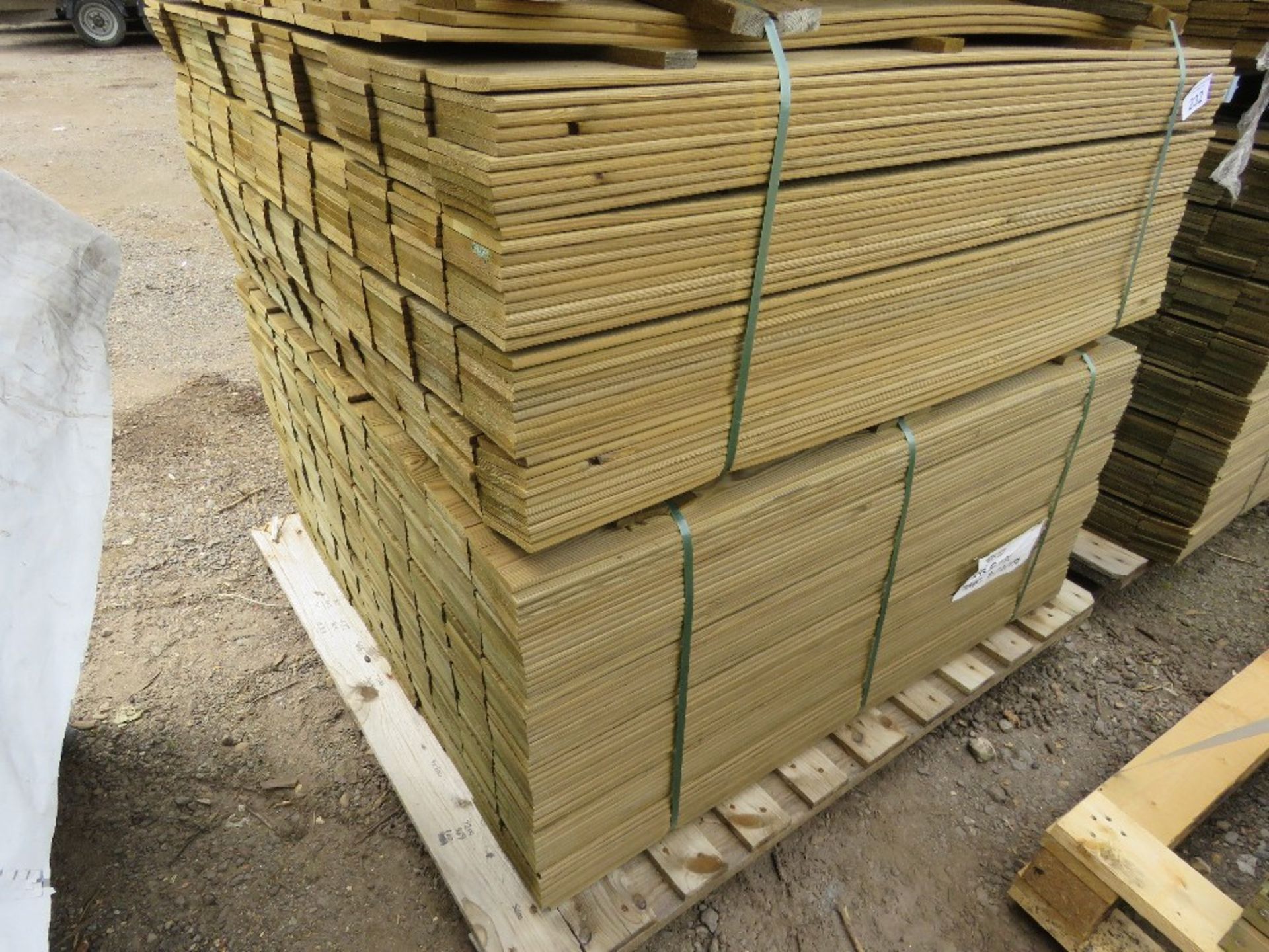 2 X PACKS OF TREATED HIT AND MISS TIMBER FENCE CLADDING BOARDS: 1.14M LENGTH X 100MM WIDTH APPROX.