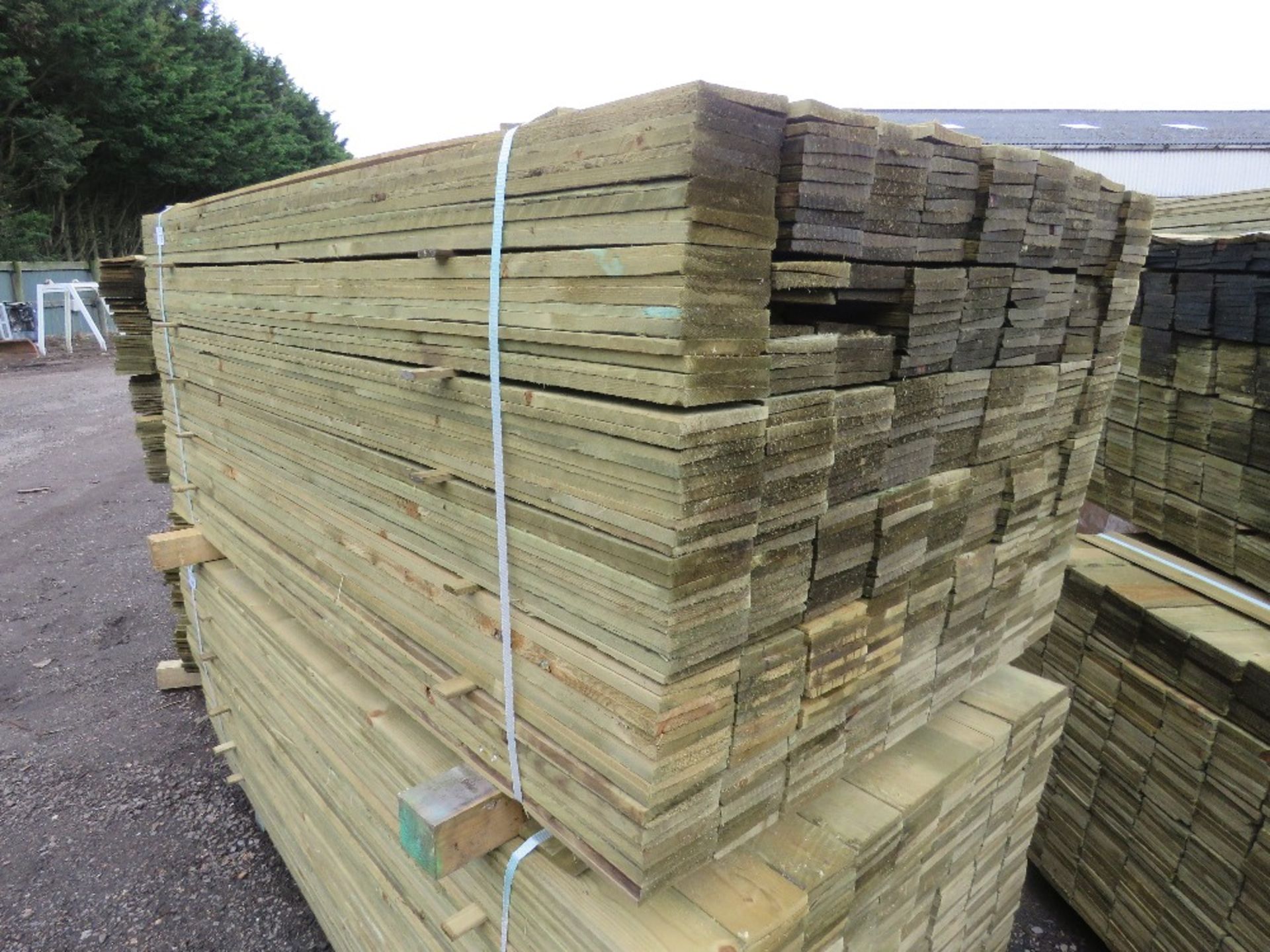 LARGE PACK OF TREATED FEATHER EDGE TIMBER CLADDING BOARDS, 1.80M LENGTH X 100MM WIDTH APPROX.