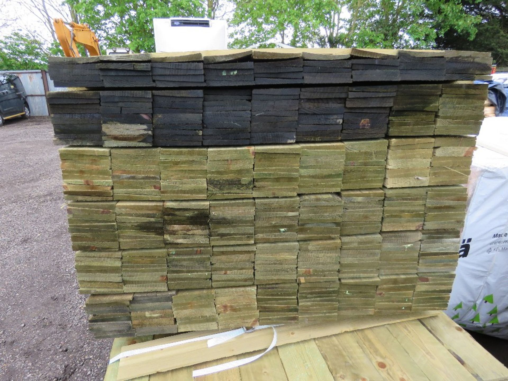 LARGE PACK OF TREATED FEATHER EDGE TIMBER CLADDING BOARDS, 1.35M LENGTH X 100MM WIDTH APPROX. - Image 2 of 2
