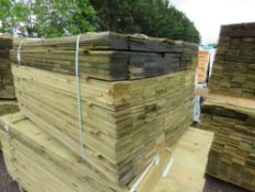 LARGE PACK OF TREATED FEATHER EDGE TIMBER CLADDING BOARDS, 1.35M LENGTH X 100MM WIDTH APPROX.