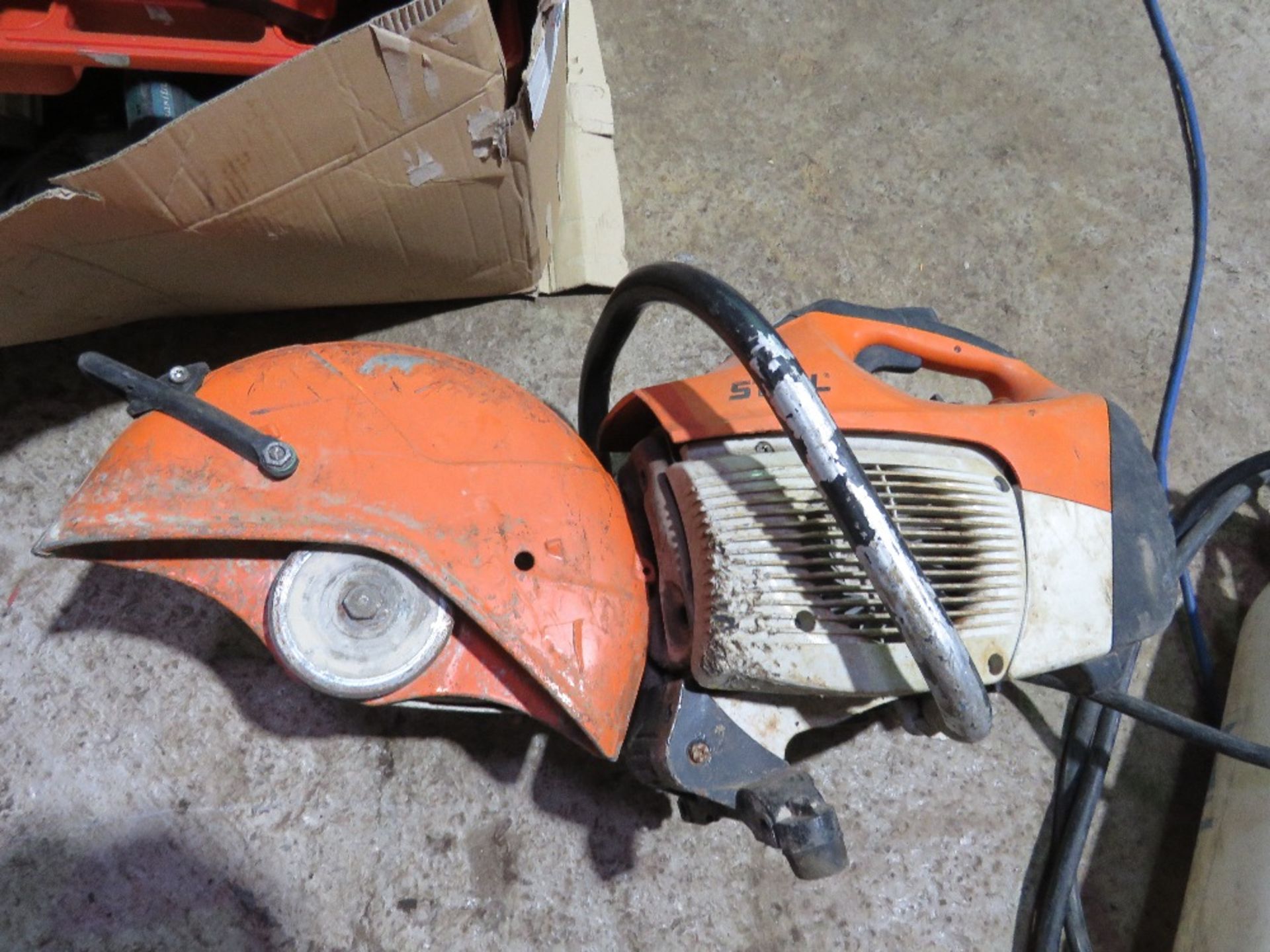 STIHL TS410 TYPE PETROL CUT OFF SAW PLUS A WET CUT BOTTLE. THIS LOT IS SOLD UNDER THE AUCTIONEERS - Image 4 of 4