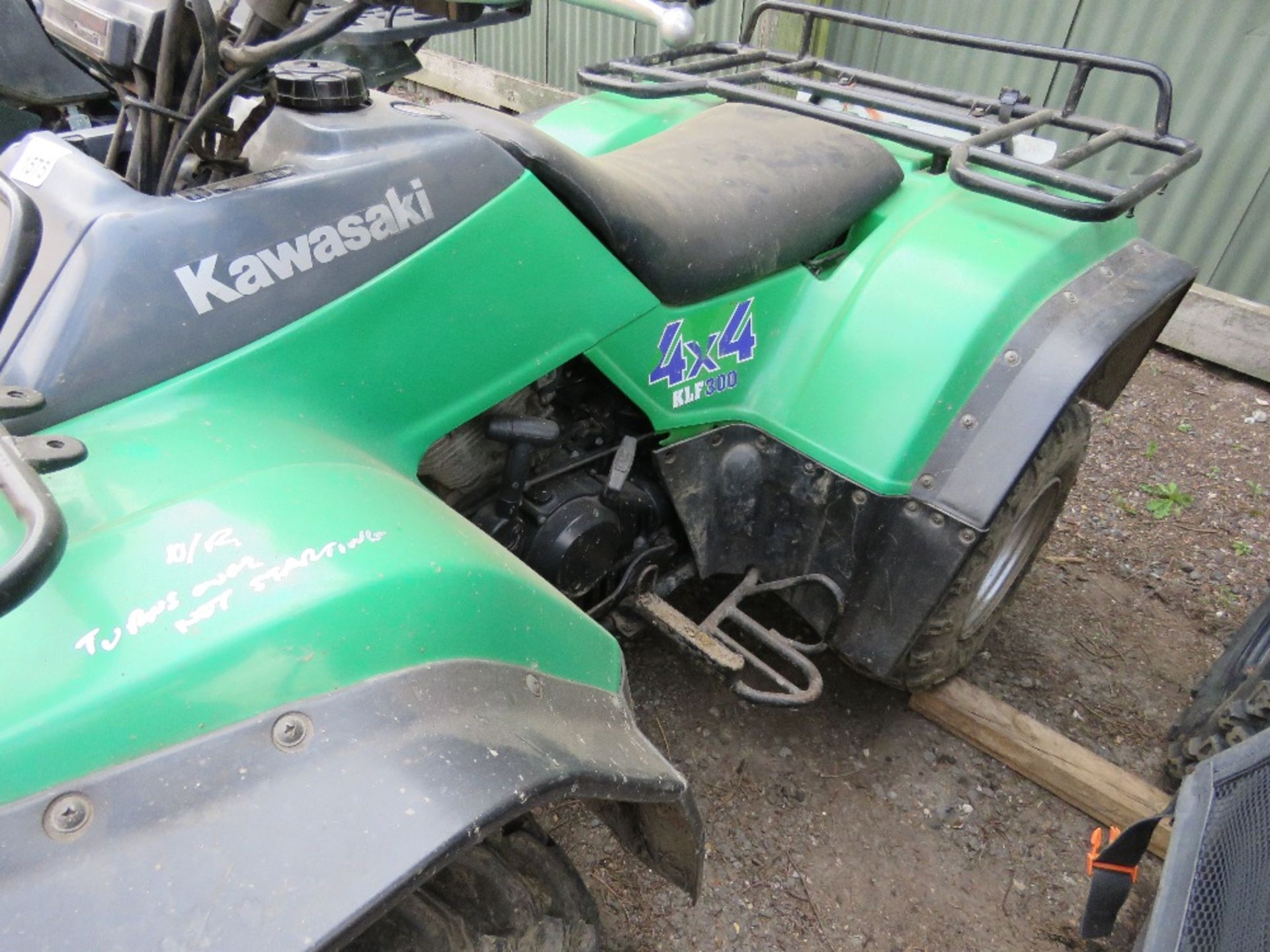 KAWASAKI KLF300 4X4 4WD PETROL ENGINED QUAD BIKE, TURNS OVER BUT NOT STARTING, CONDITION UNKNOWN, SO - Image 3 of 8