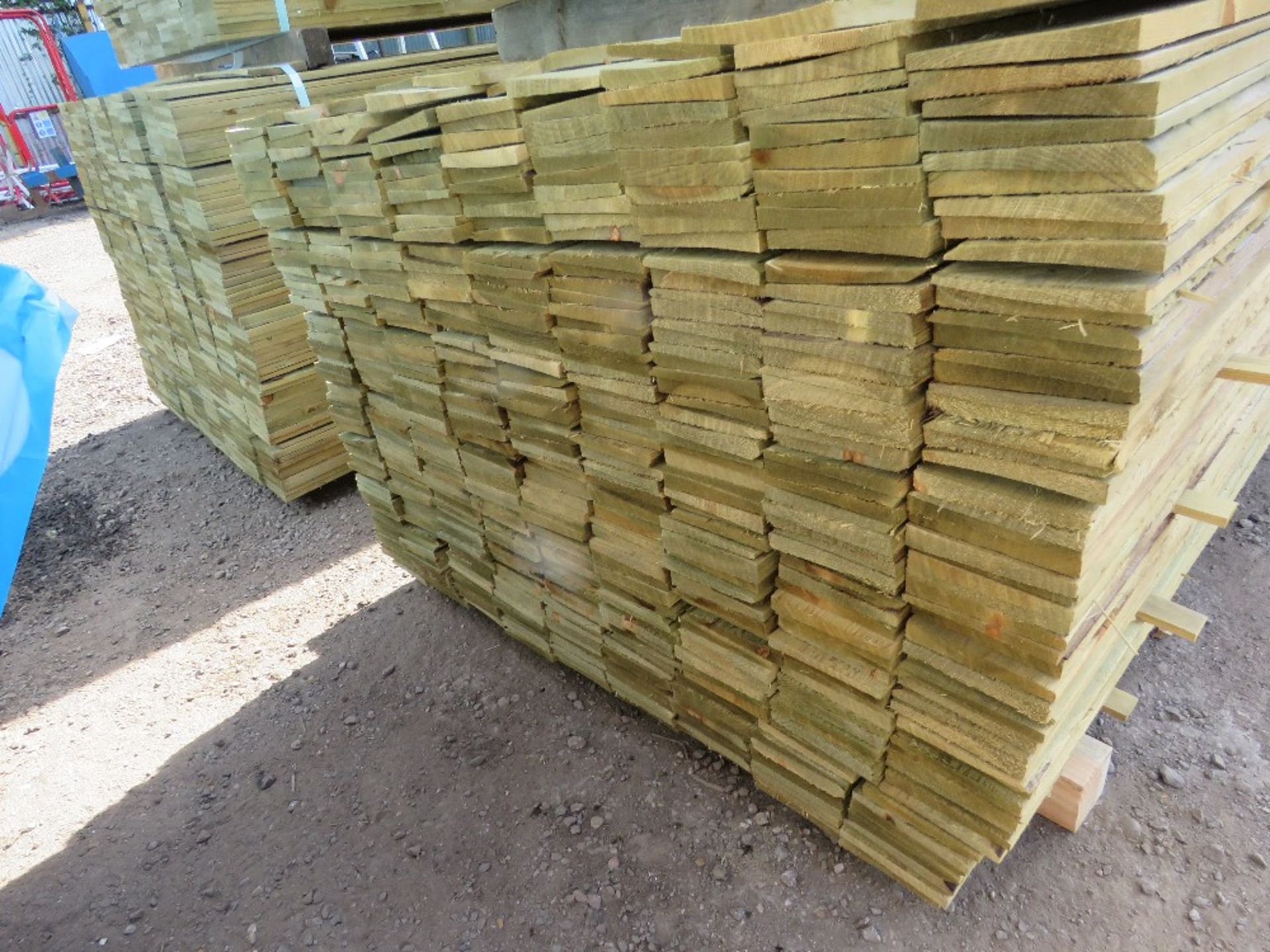 LARGE PACK OF TREATED FEATHER EDGE FENCE CLADDING BOARDS: 1.8M LENGTH X 100MM WIDTH APPROX. - Image 2 of 3