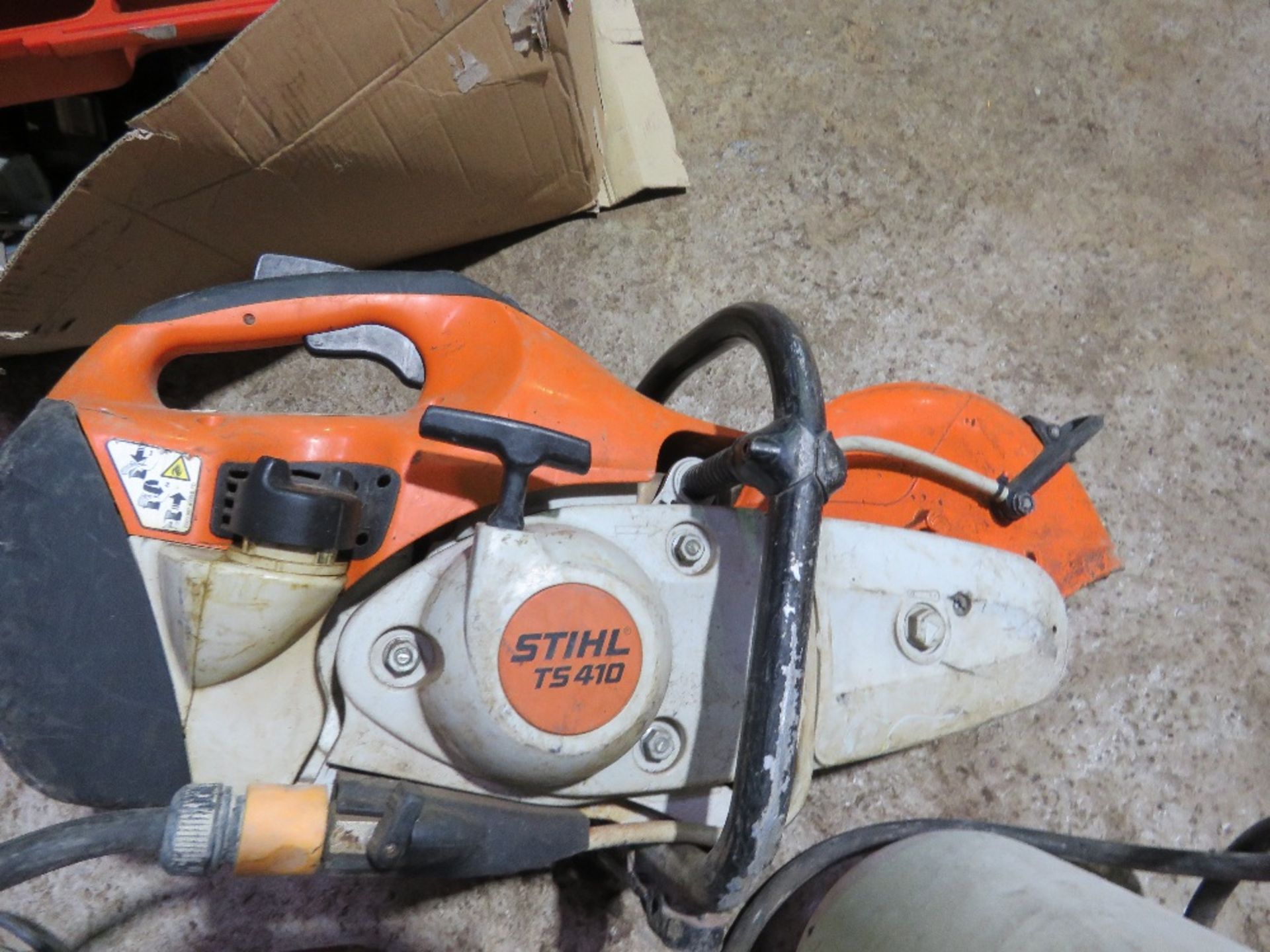 STIHL TS410 TYPE PETROL CUT OFF SAW PLUS A WET CUT BOTTLE. THIS LOT IS SOLD UNDER THE AUCTIONEERS - Image 3 of 4