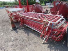 2 X STACKS OF RED AND WHITE METAL PEDESTRIAN BARRIERS, 43NO APPROX IN TOTAL. THIS LOT IS SOLD UND
