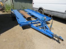 TWIN AXLED CAR TRANSPORT TRAILER WITH WINCH AND RAMPS. 13FT X 6FT BED APPROX. THIS LOT IS SOLD UN