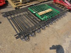 5NO HOOP TOP IRON RAININGS PLUS A SMALL GATE. RAILINGS ARE 9FT LENGTH X 1M HEIGHT APPROX.