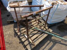 HOLE DIGGING SPADE PLUS 2NO TRESTLE STANDS. THIS LOT IS SOLD UNDER THE AUCTIONEERS MARGIN SCHEME,