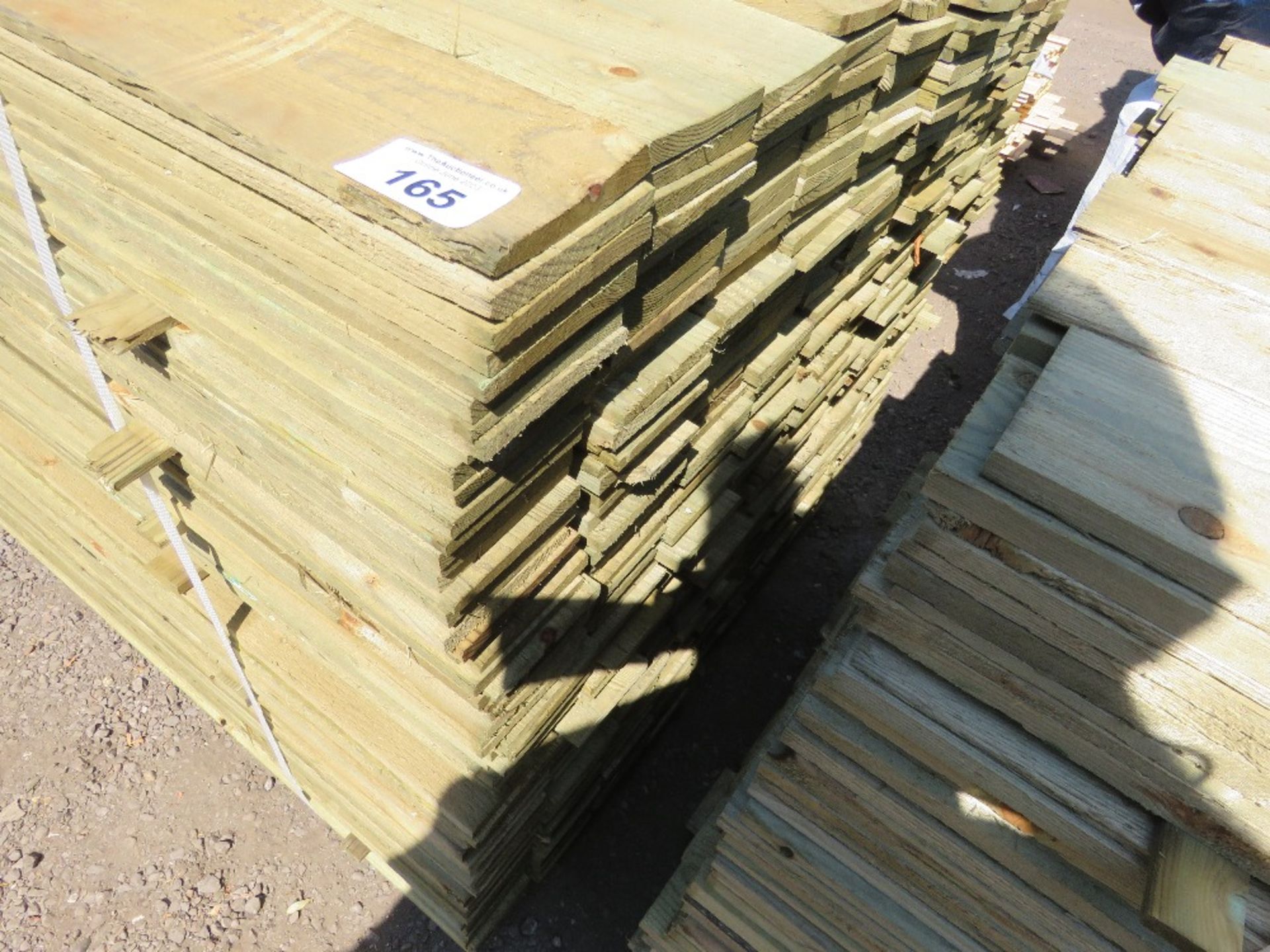 LARGE PACK OF TREATED FEATHER EDGE TIMBER CLADDING BOARDS: 1.8M LENGTH X 100MM WIDTH APPROX. - Image 2 of 3