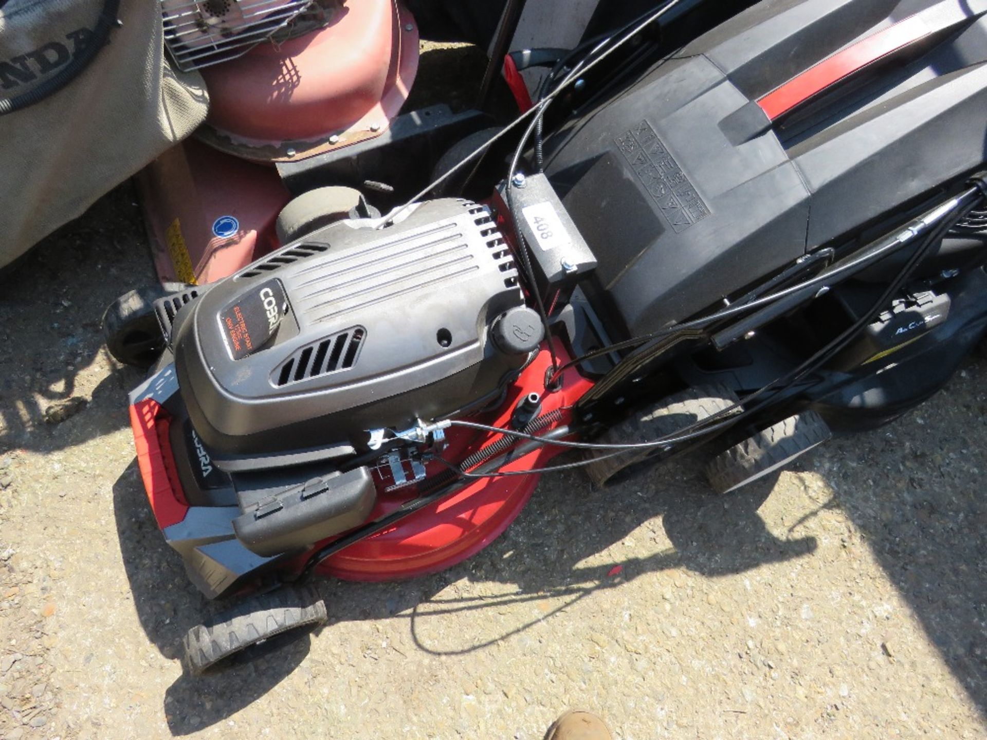 COBRA HEAVY DUTY PETROL ENGINED LAWNMOWER, WITH COLLECTOR. THIS LOT IS SOLD UNDER THE AUCTIONEERS