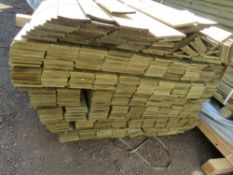 PACK OF TREATED HIT AND MISS TIMBER CLADDING BOARDS: 1.74M X 100MM APPROX.