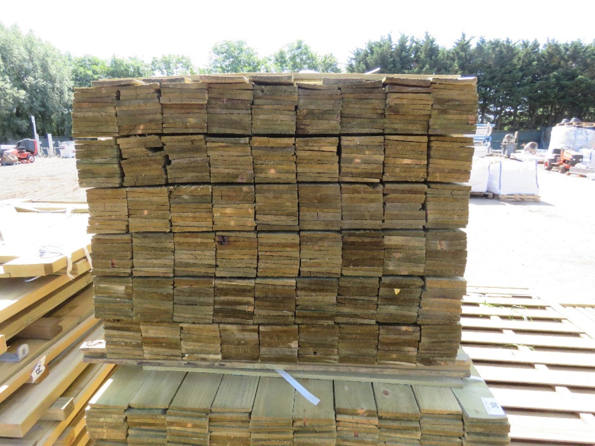 LARGE PACK OF TREATED FEATHER EDGE TIMBER CLADDING BOARDS: 1.5M LENGTH X 100MM WIDTH APPROX. - Image 2 of 3